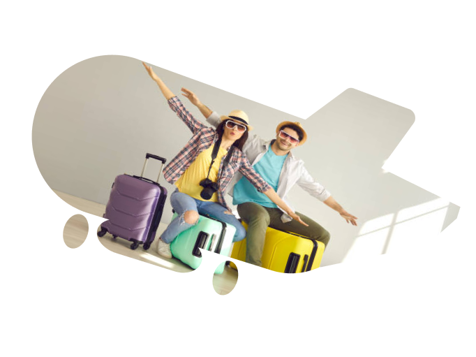 aeroplane shaped image with a couple sitting on their luggage